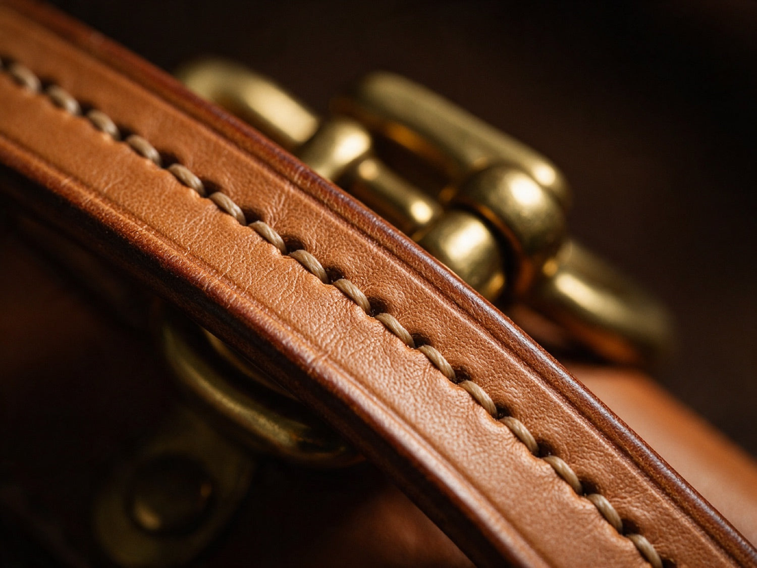 A hand-stitched saddle seam, which can be cut out and redone without harming the leather